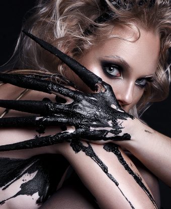 Fashion_portrait_of_a_young_girl_with_hairstyle_and_make_up_on_a
